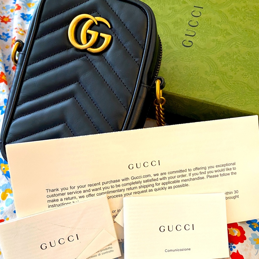 Gucci sling bag looks new complete dust bag, receipt and box included